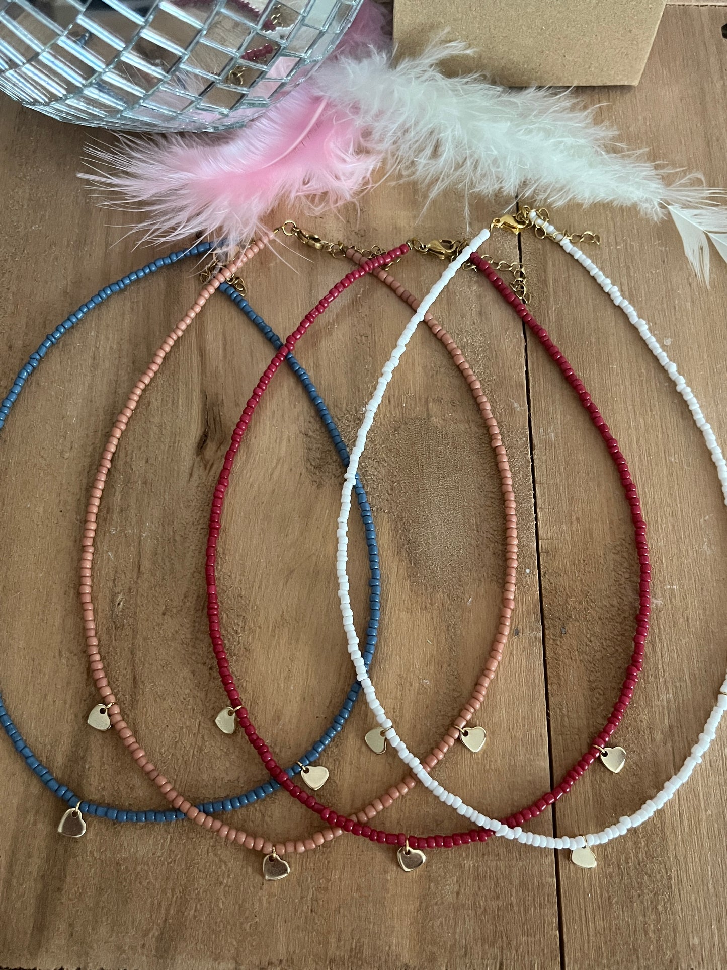 collier perles breloques coeur