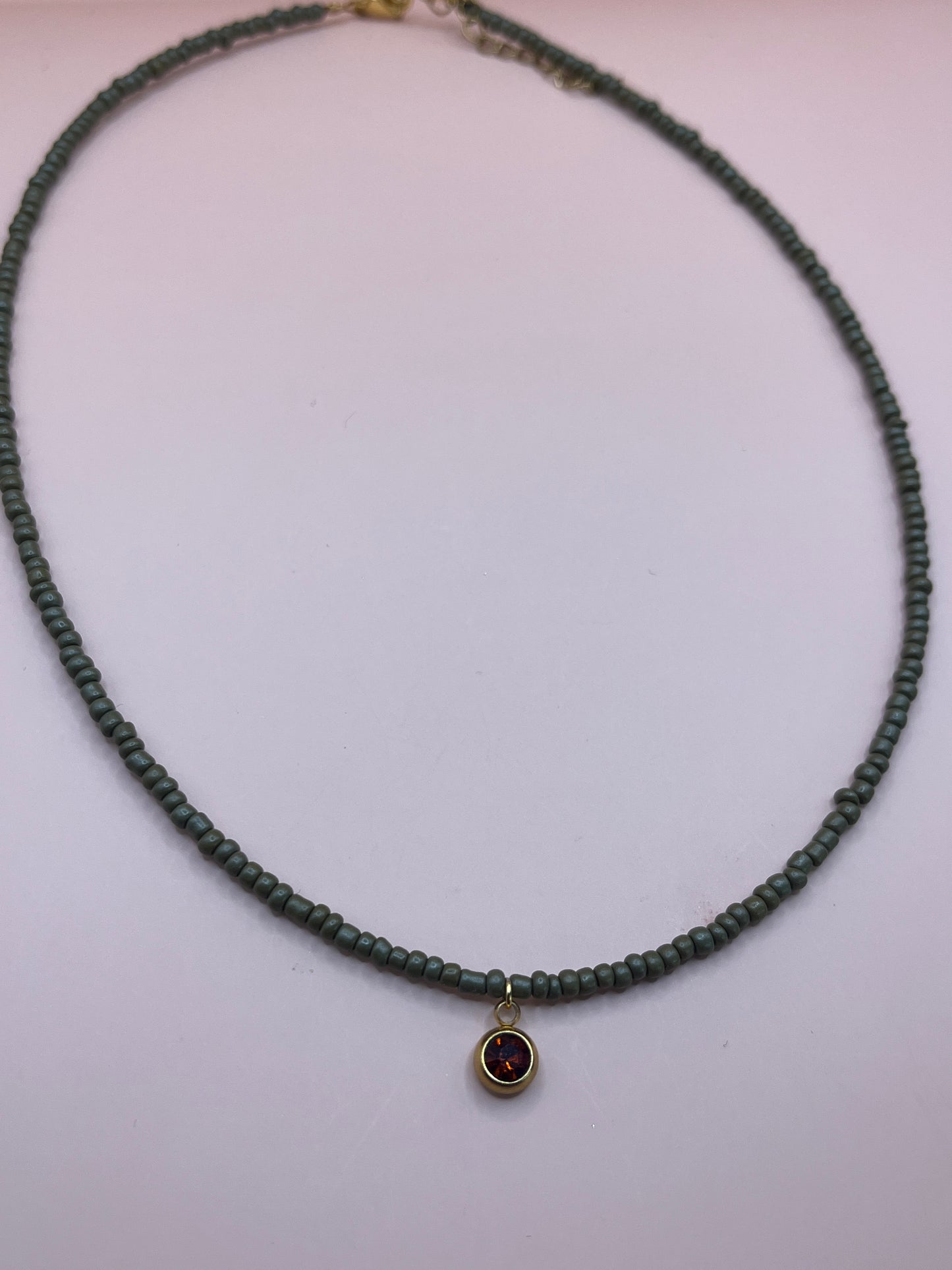 collier perles tendance medaillon