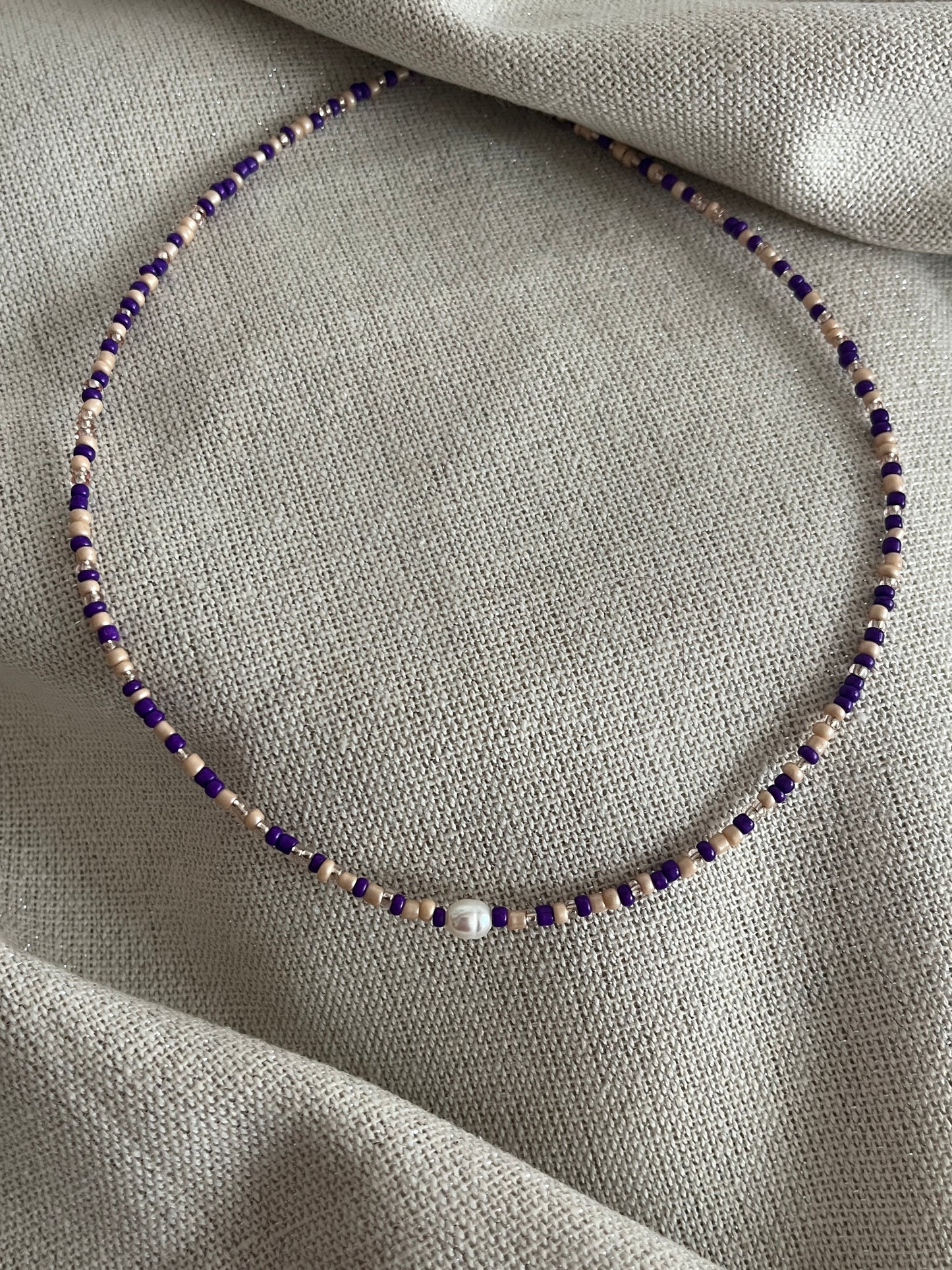 collier perles violet brille