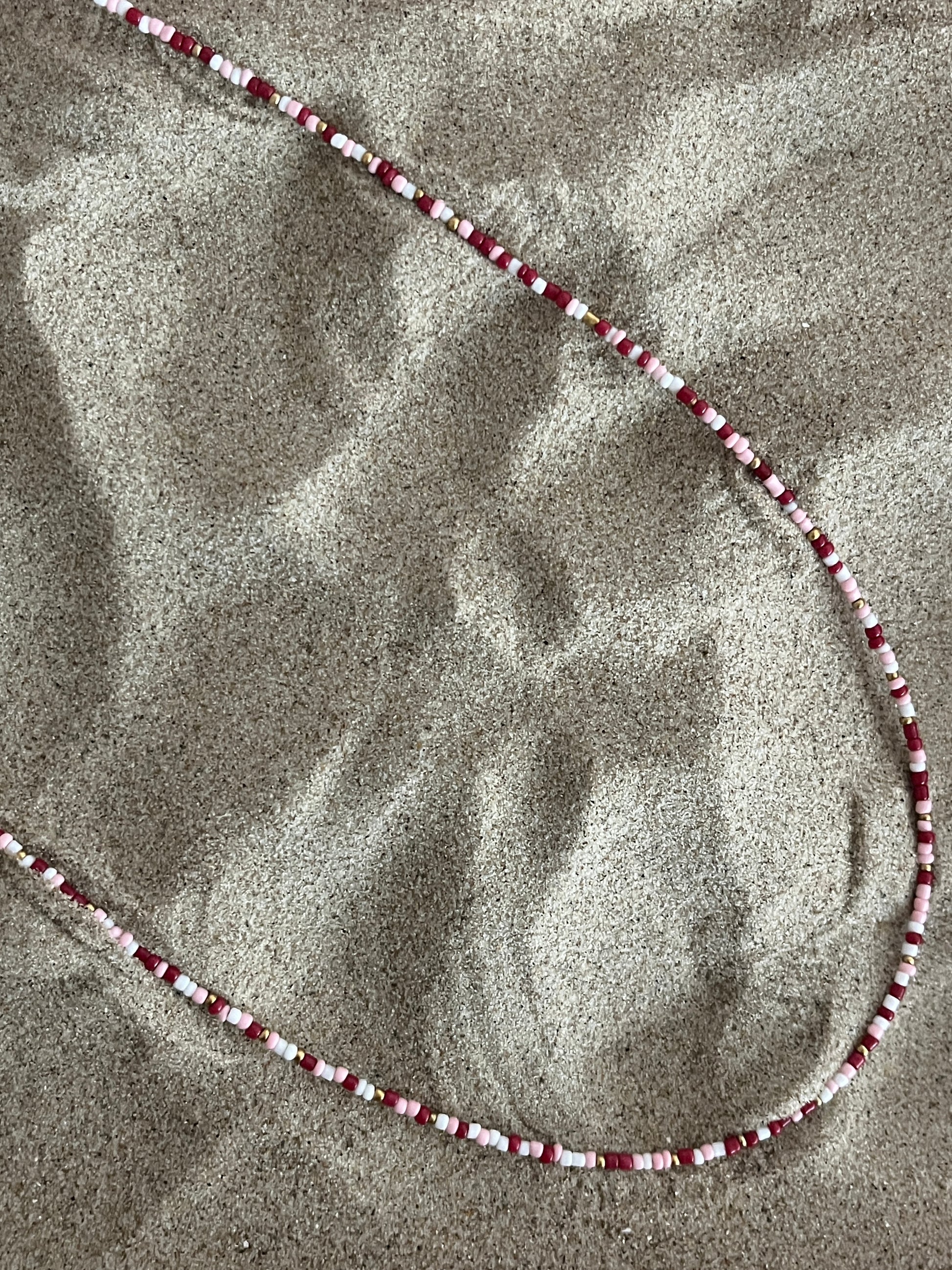 collier sautoir bordeaux